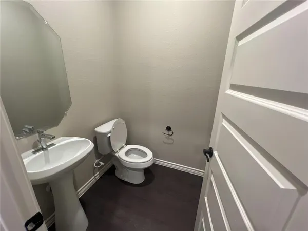 a bathroom with a sink and a toilet
