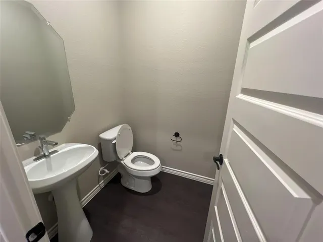 a bathroom with a sink and a toilet