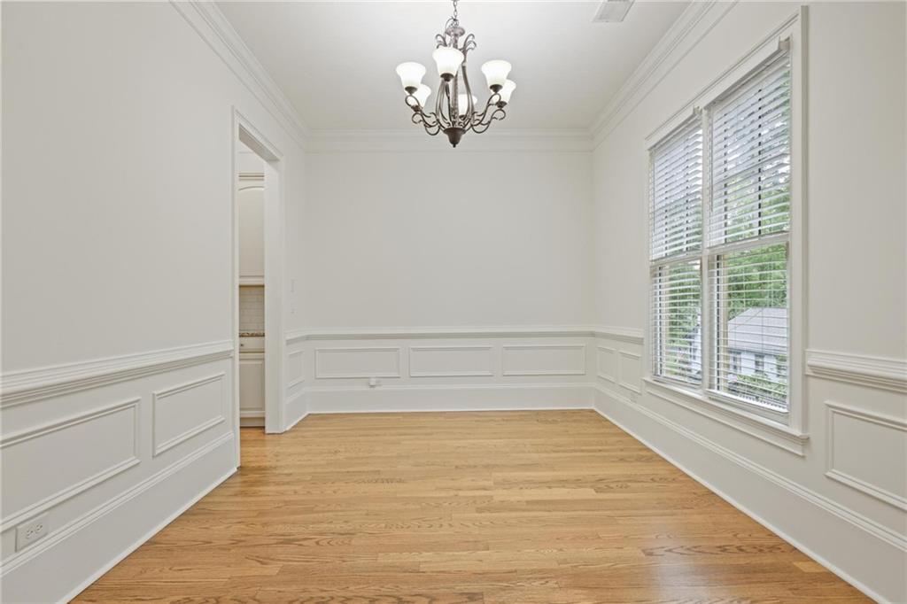 232 Hunt Street Northeast Marietta, GA 30060 - Photo 13 of 29 a view of an empty room with a window