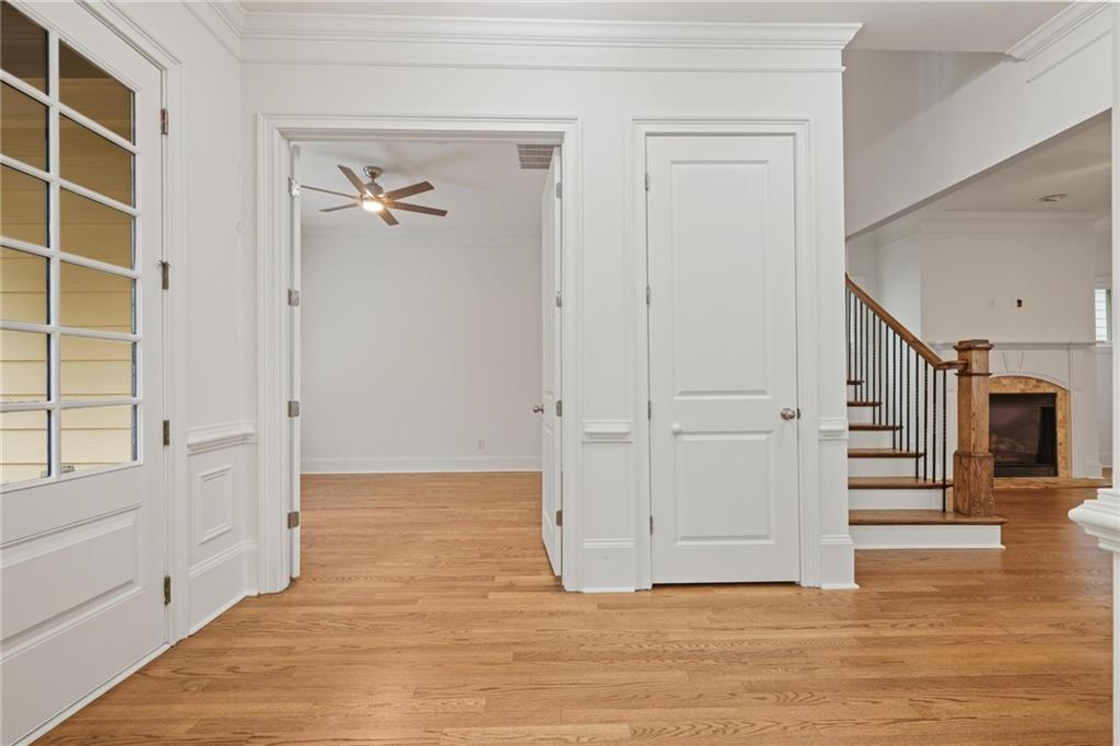 232 Hunt Street Northeast Marietta, GA 30060 - Photo 15 of 29 a view of a hallway with wooden floor and closet