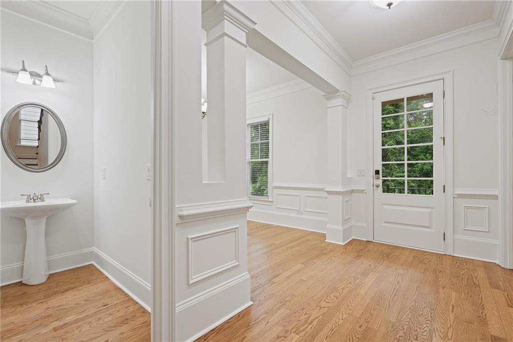 232 Hunt Street Northeast Marietta, GA 30060 - Photo 17 of 29 an empty room with a window and wooden floor