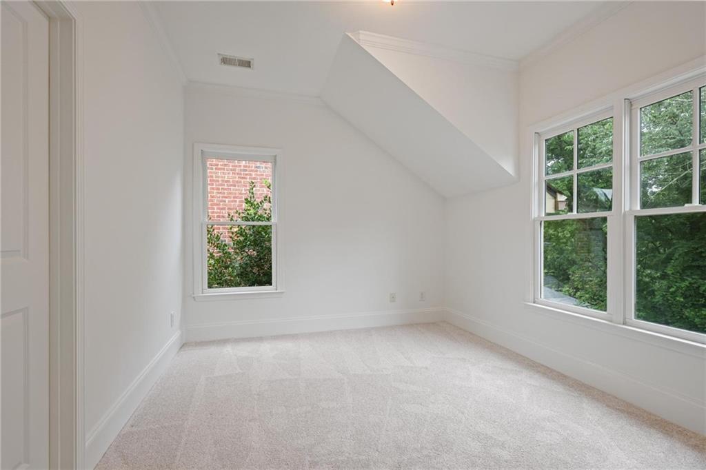 232 Hunt Street Northeast Marietta, GA 30060 - Photo 26 of 29 an empty room with windows