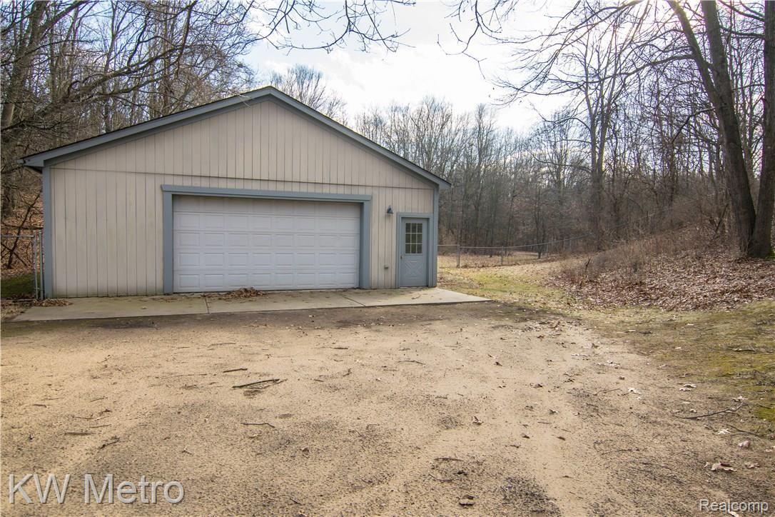 2211 West Wardlow Road Highland, MI 48357 - Photo 47 of 53 HEATED polebarn has separate tank for barn & pool.