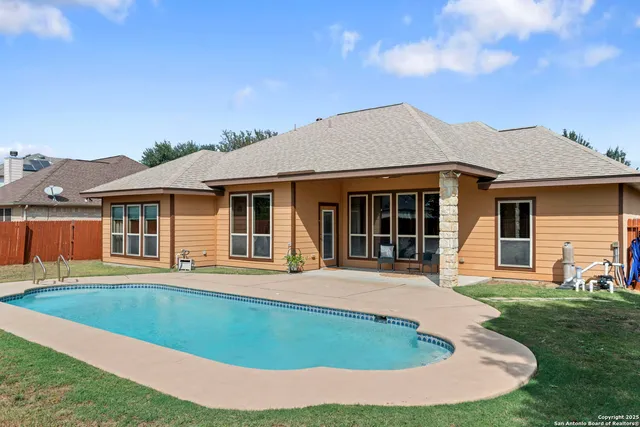 front view of a house with a garden