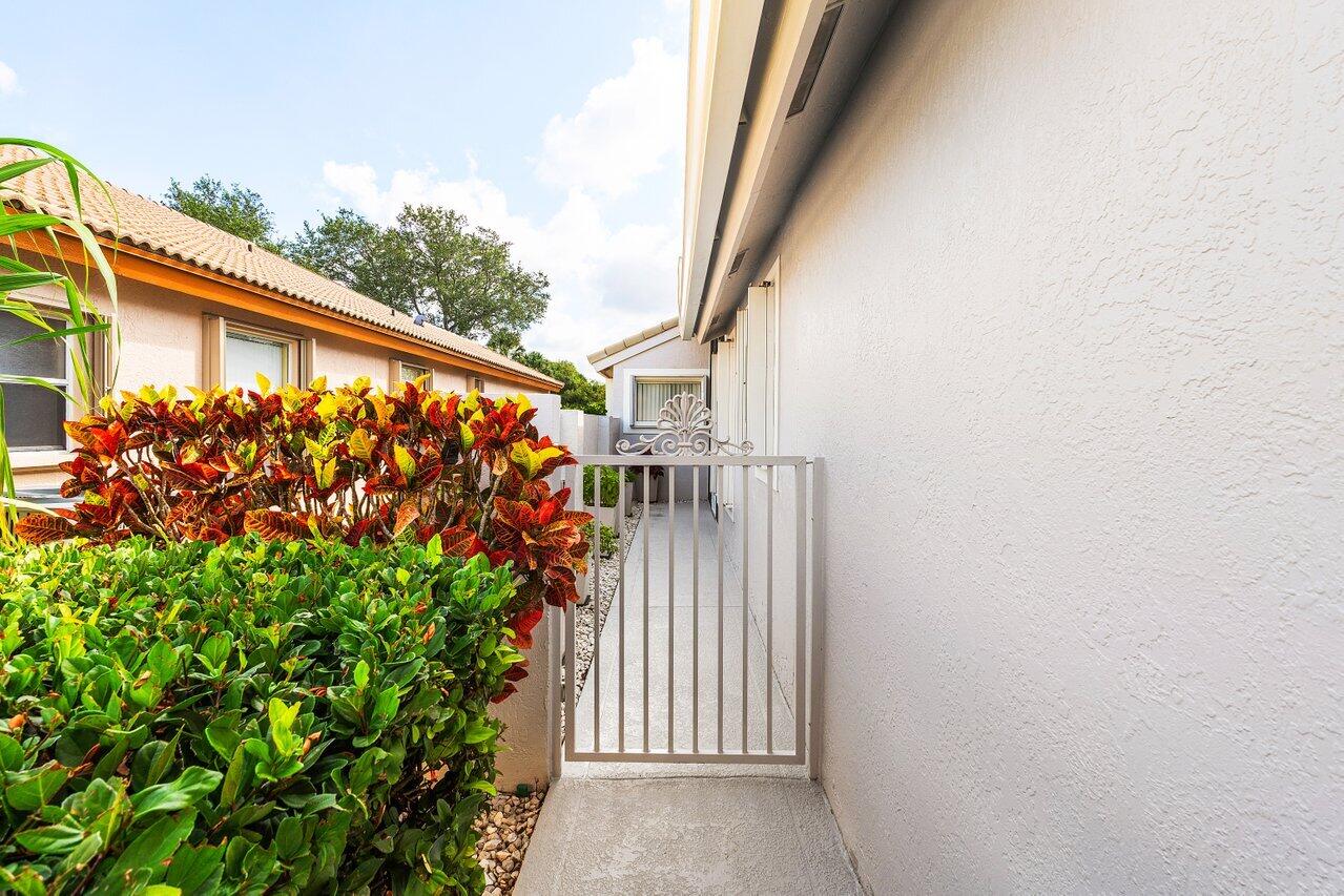2802 Waters Edge Circle Greenacres, FL 33413 - Photo 4 of 52 Entry Walk Way