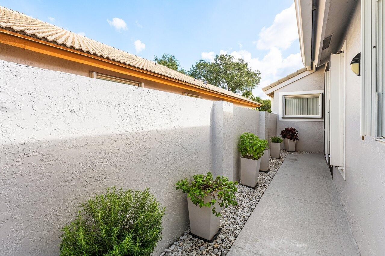 2802 Waters Edge Circle Greenacres, FL 33413 - Photo 5 of 52 Walkway