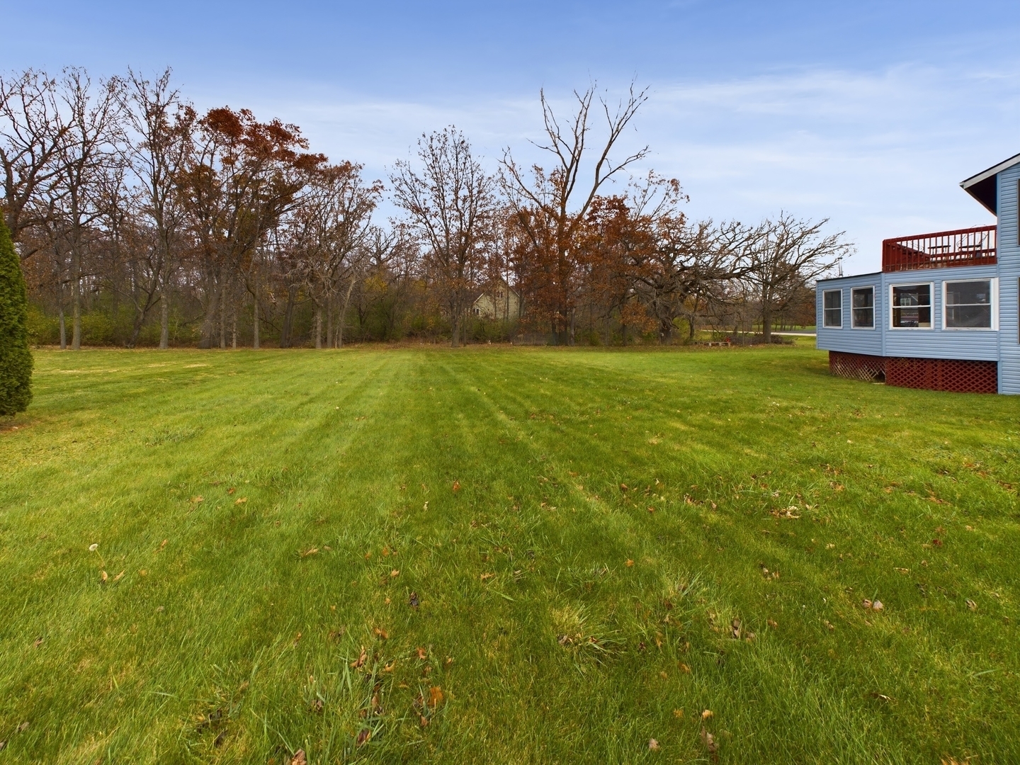 15840 Overlook Lane Huntley, IL 60142 - Photo 38 of 42 a view of a big yard with plants and trees