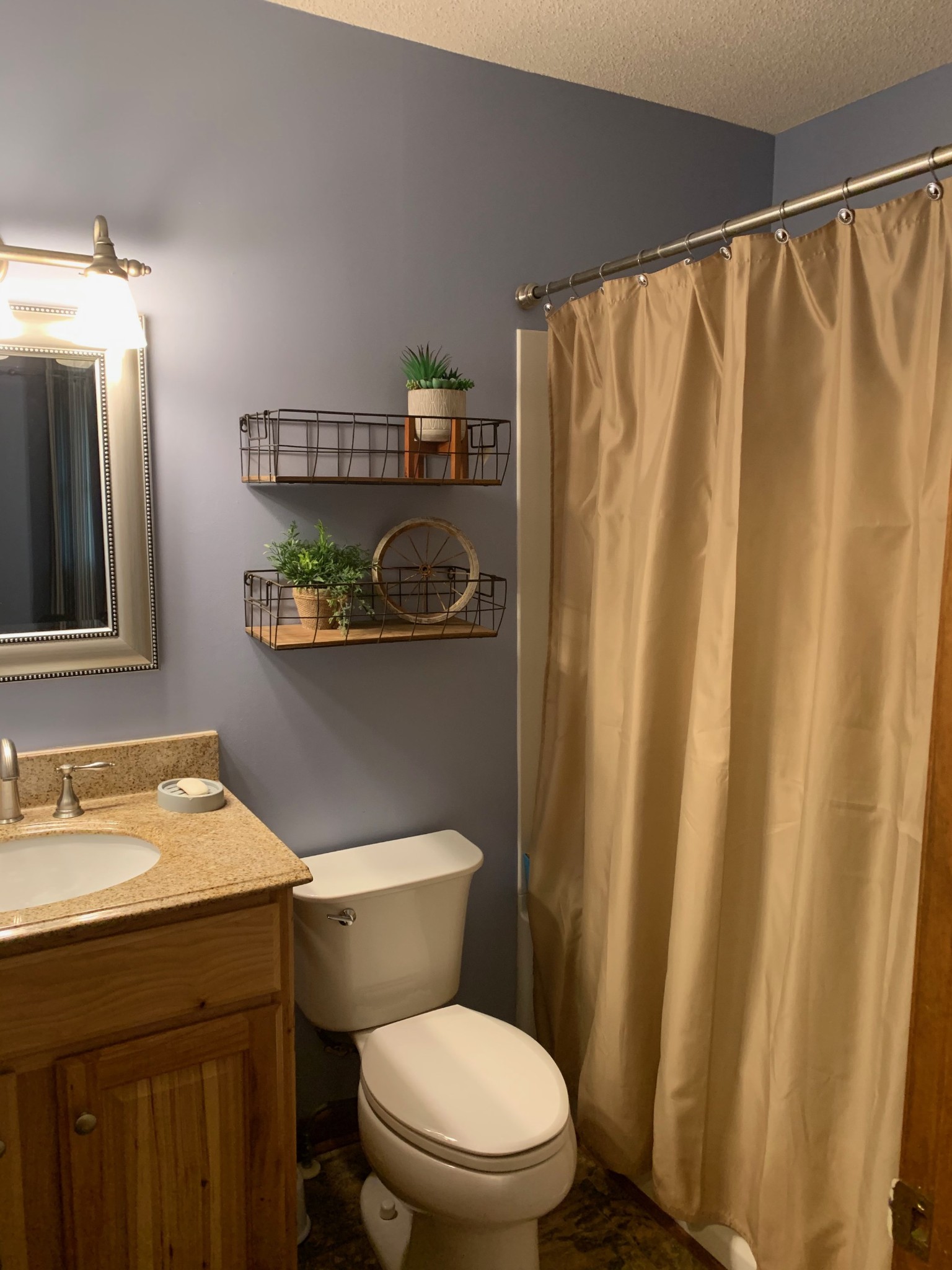 40 Smith Road Fayetteville, TN 37334 - Photo 11 of 14 a white toilet sitting next to a bathroom sink