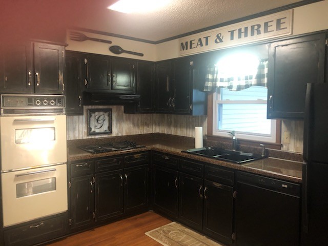 40 Smith Road Fayetteville, TN 37334 - Photo 3 of 14 a kitchen with a sink and a window