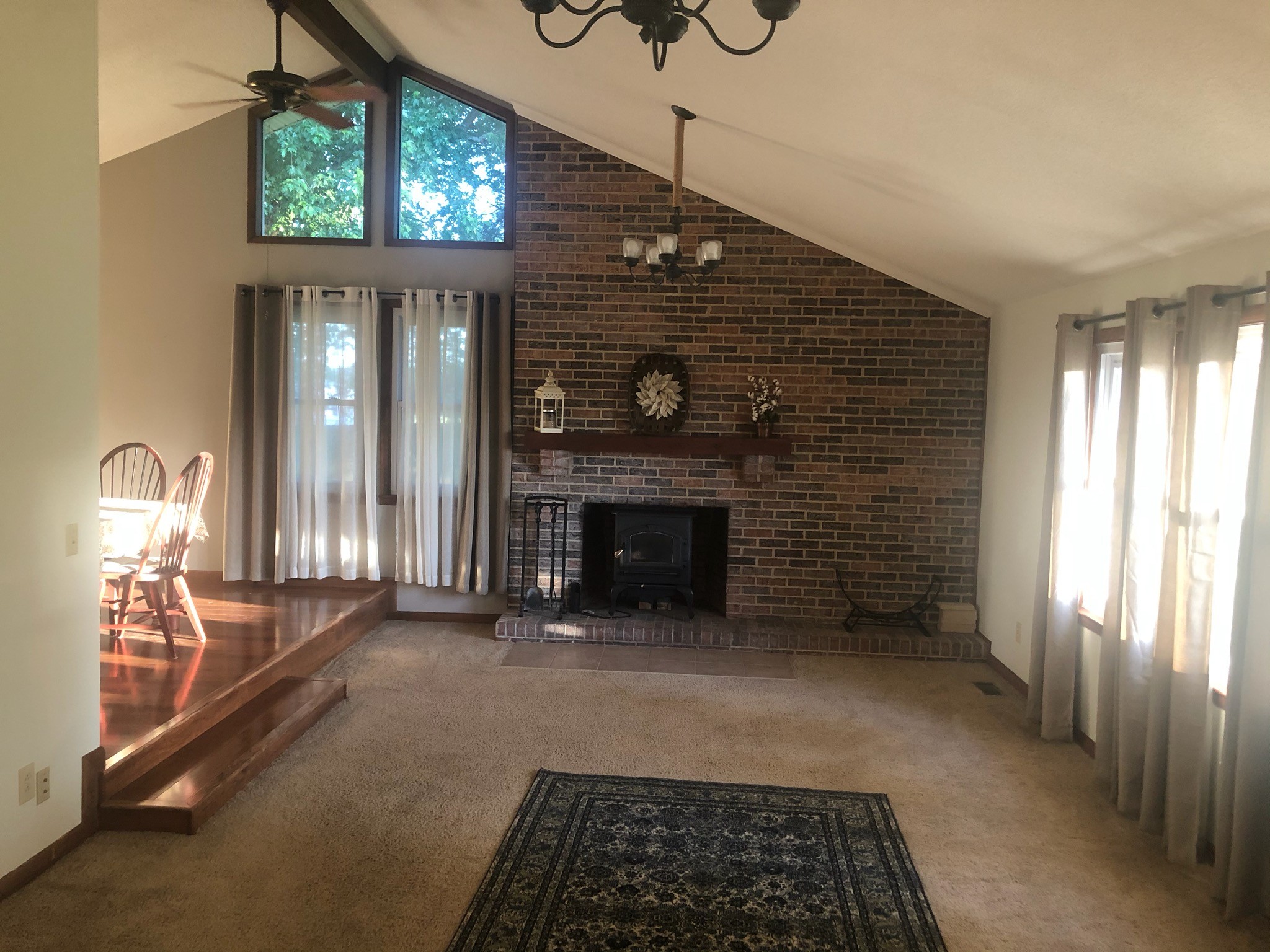 40 Smith Road Fayetteville, TN 37334 - Photo 6 of 14 a hallway with a fireplace and a window