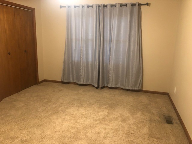 40 Smith Road Fayetteville, TN 37334 - Photo 8 of 14 a view of an empty room with a wooden door