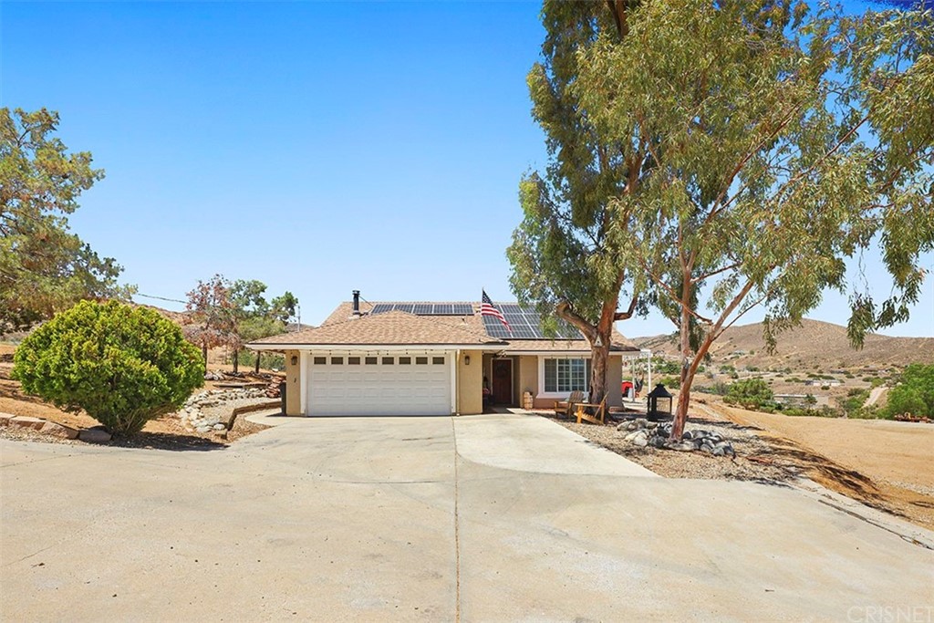 34750 Garlock Road Acton, CA 93510 - Photo 1 of 1 a house with trees in front of it