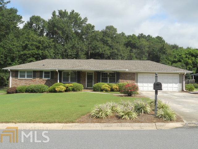 4292 Compton Circle, Unit 3 Powder Springs, GA 30127 - Photo 1 of 1 front view of a house with a yard