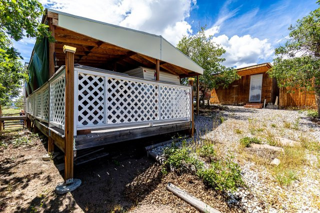 1840 East Ridge Road, Unit 177 Salina, UT 84654 - Photo 1 of 26 Expansive outdoor decking featuring white lattice railing and a covered patio area