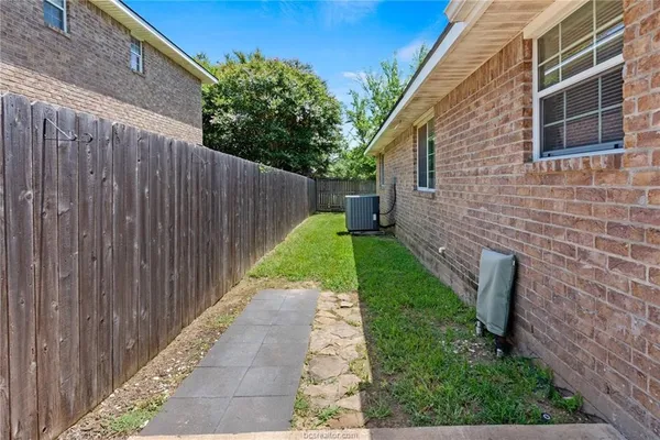 a view of a backyard with a garden