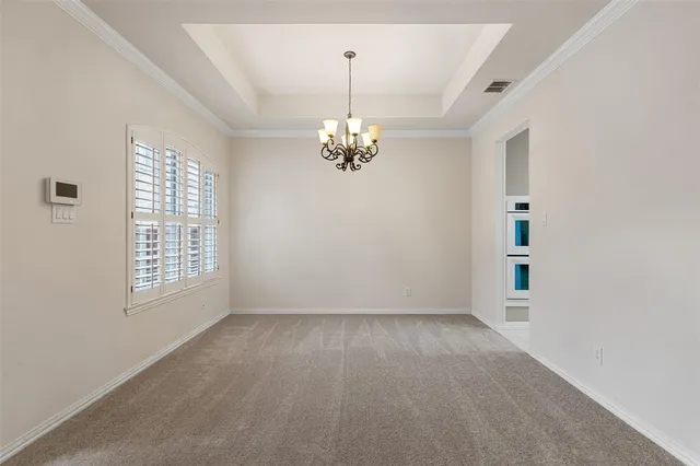 a view of a livingroom with a chandelier