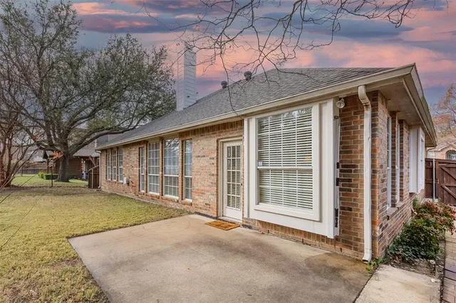 a view of backyard with green space