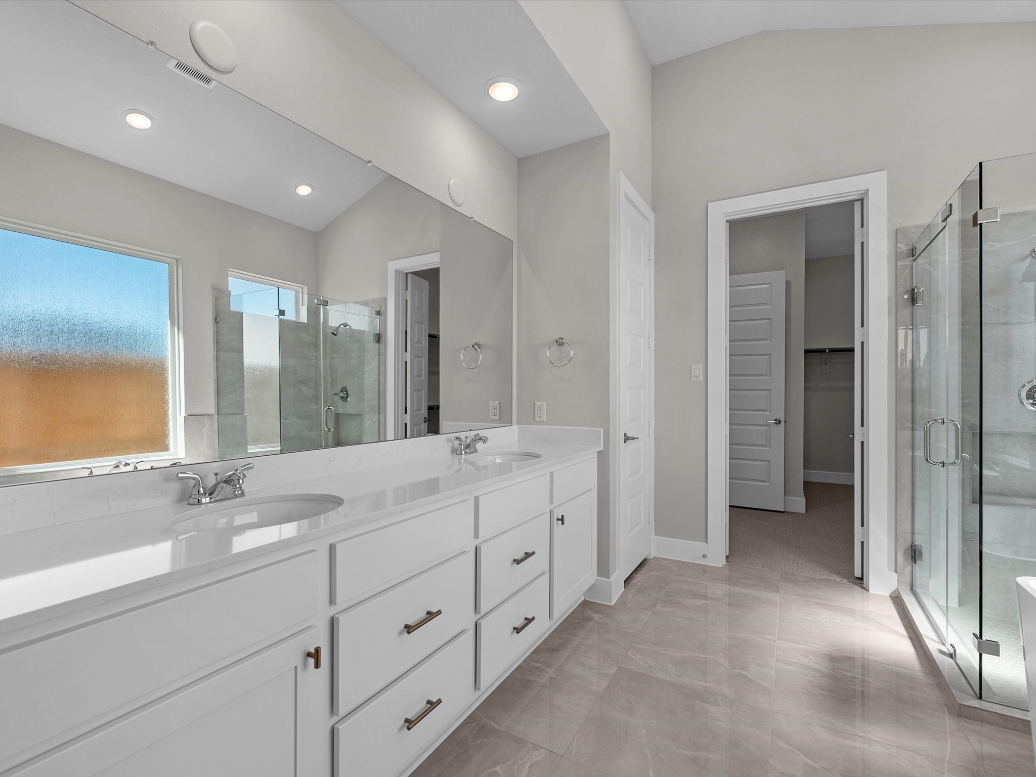 7922 Antler Rdg Drive Fulshear, TX 77441 - Photo 12 of 31 a spacious bathroom with double vanity and mirrors