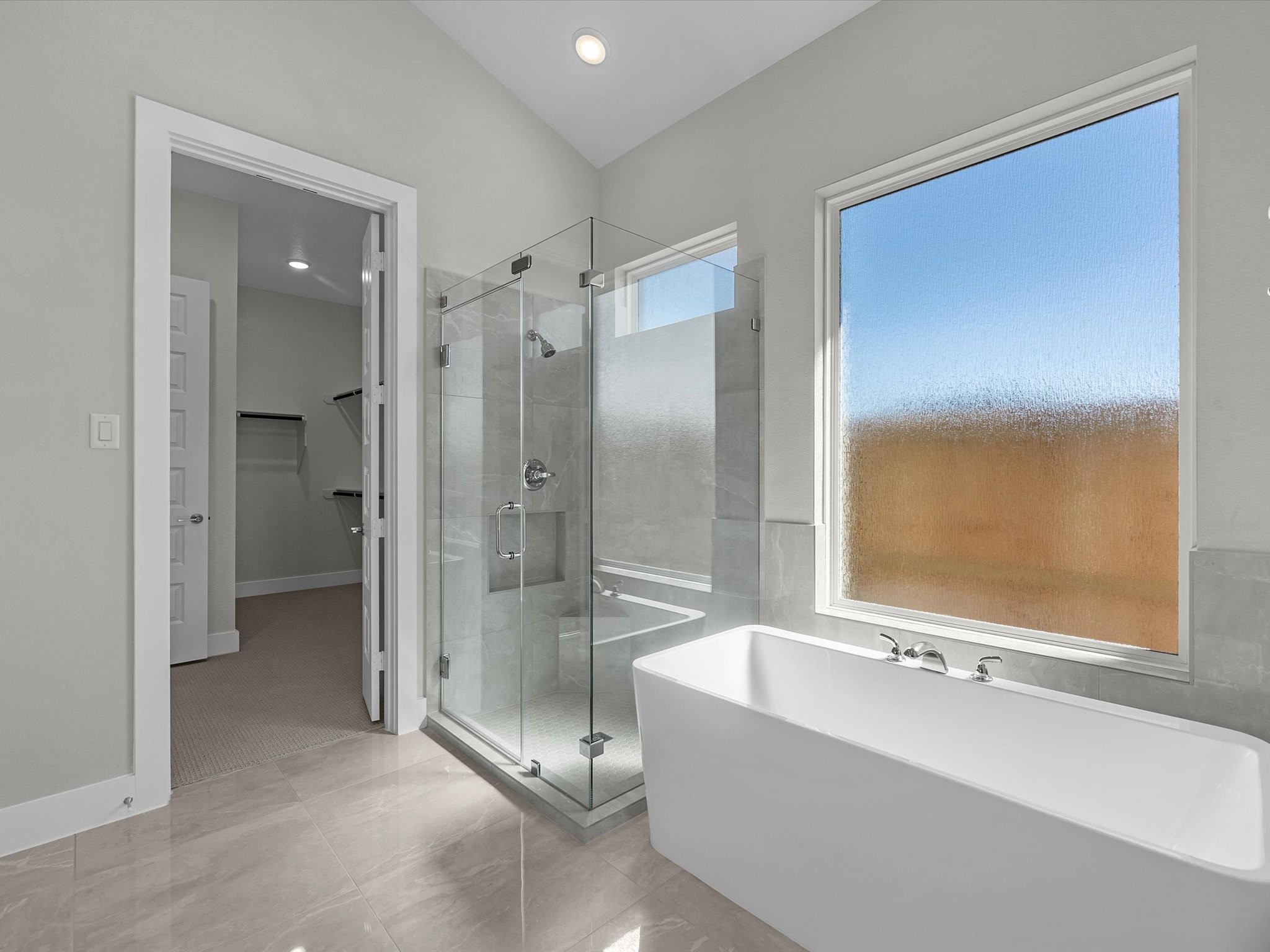 7922 Antler Rdg Drive Fulshear, TX 77441 - Photo 13 of 31 a bathroom with a bathtub and a shower