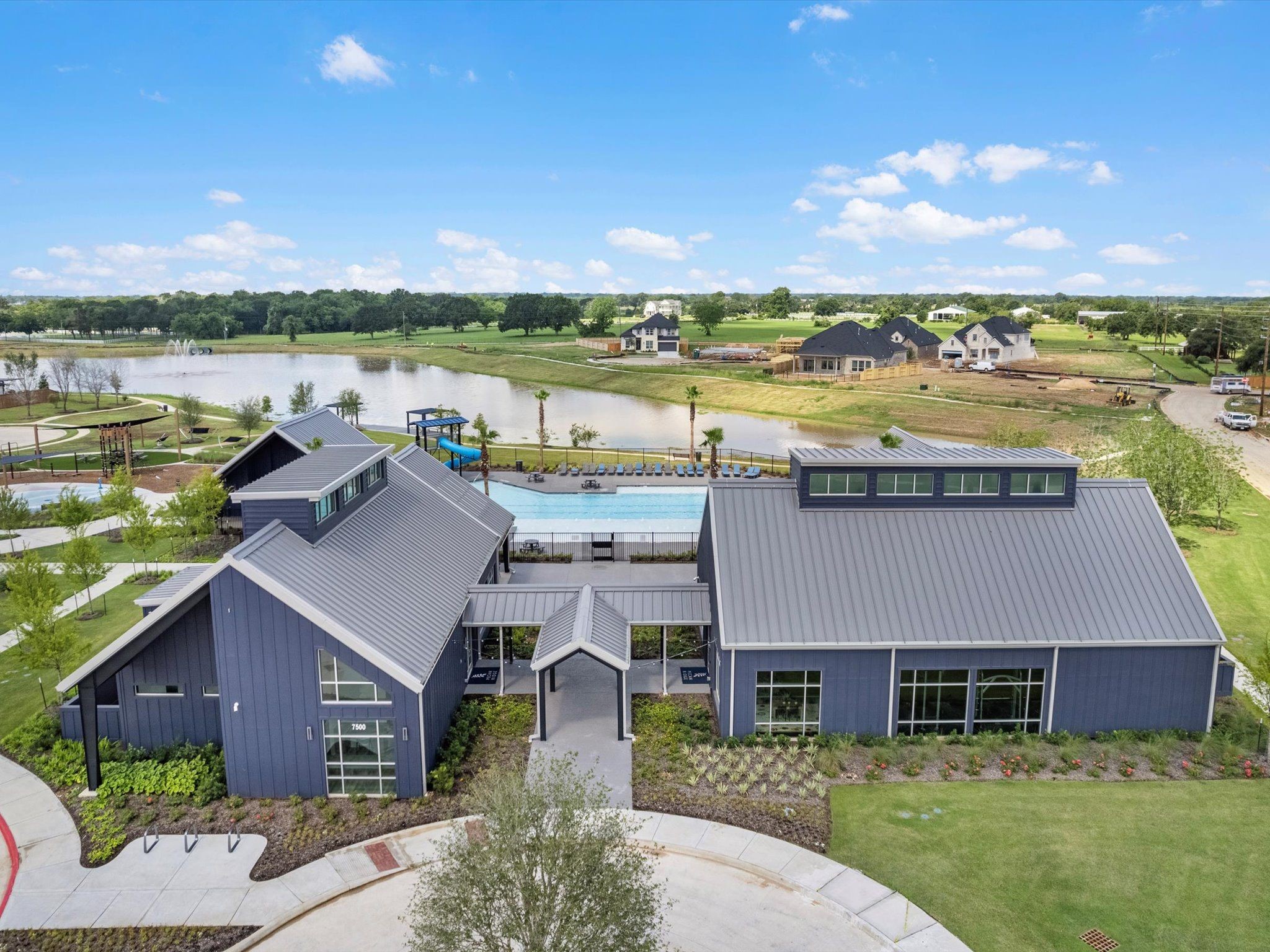 7922 Antler Rdg Drive Fulshear, TX 77441 - Photo 30 of 31 a aerial view of a house with lake view and a big yard