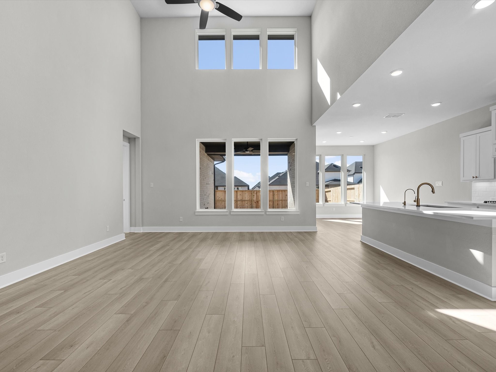 7922 Antler Rdg Drive Fulshear, TX 77441 - Photo 5 of 31 a view of workspace with wooden floor and a sink