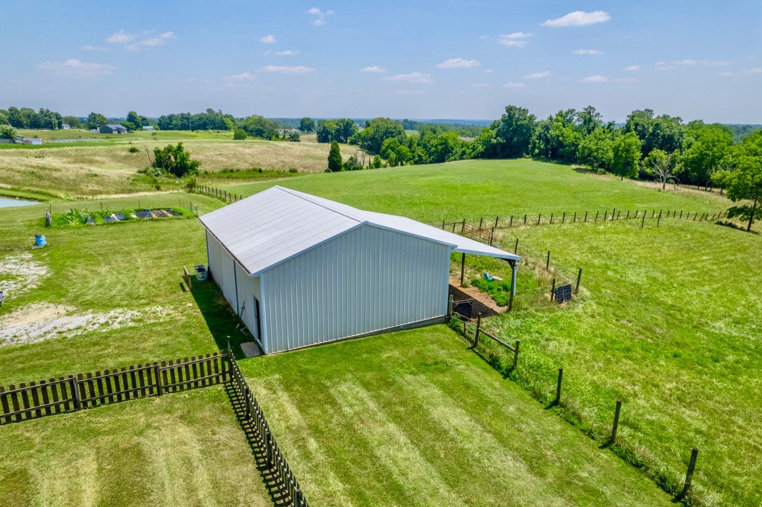 16562 Highway 250 Rising Sun, IN 47040 - Photo 30 of 70 30 x 40 Animal barn with a tack room and two sliding doors