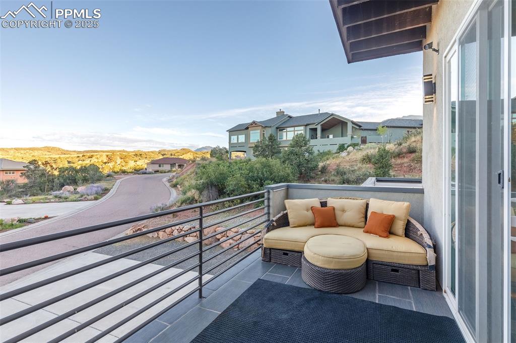 162 Crystal Valley Road Manitou Springs, CO 80829 - Photo 15 of 48 a view of a balcony with furniture and city view