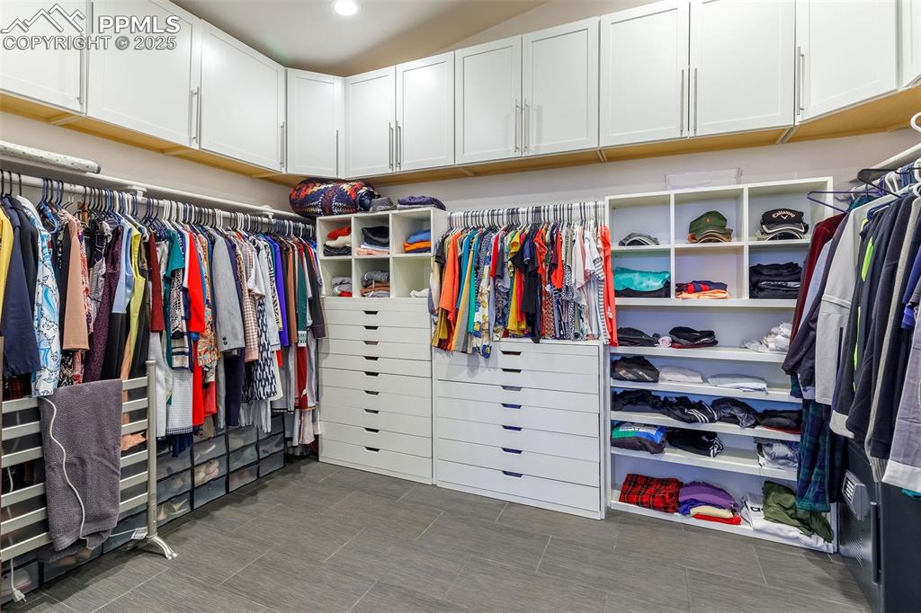 162 Crystal Valley Road Manitou Springs, CO 80829 - Photo 39 of 48 a view of walk in closet with clothes and shoes