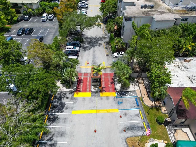 an aerial view of a house with outdoor space