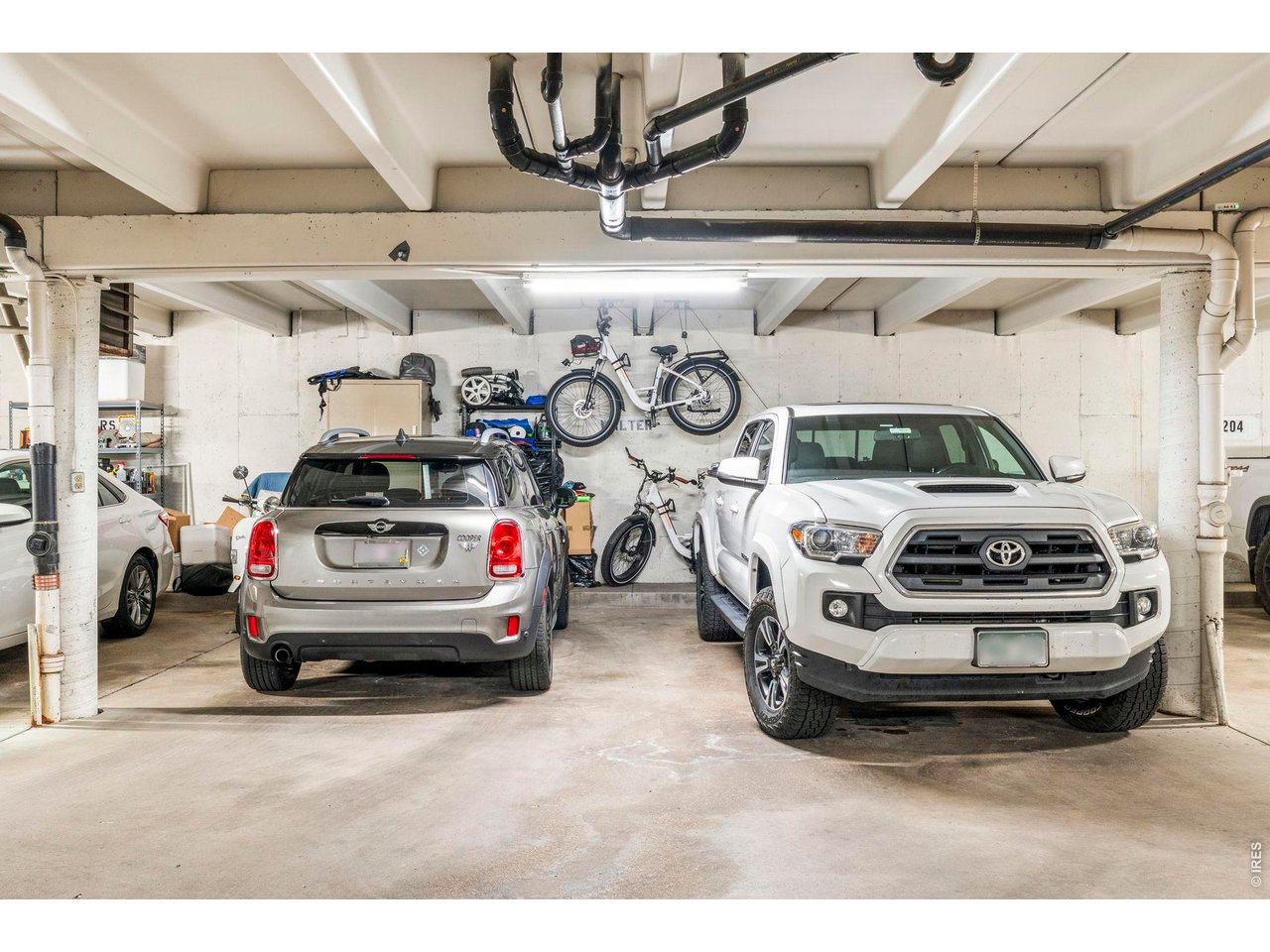 39 Ward Drive, Unit 104 Greeley, CO 80634 - Photo 26 of 31 a car parked in garage