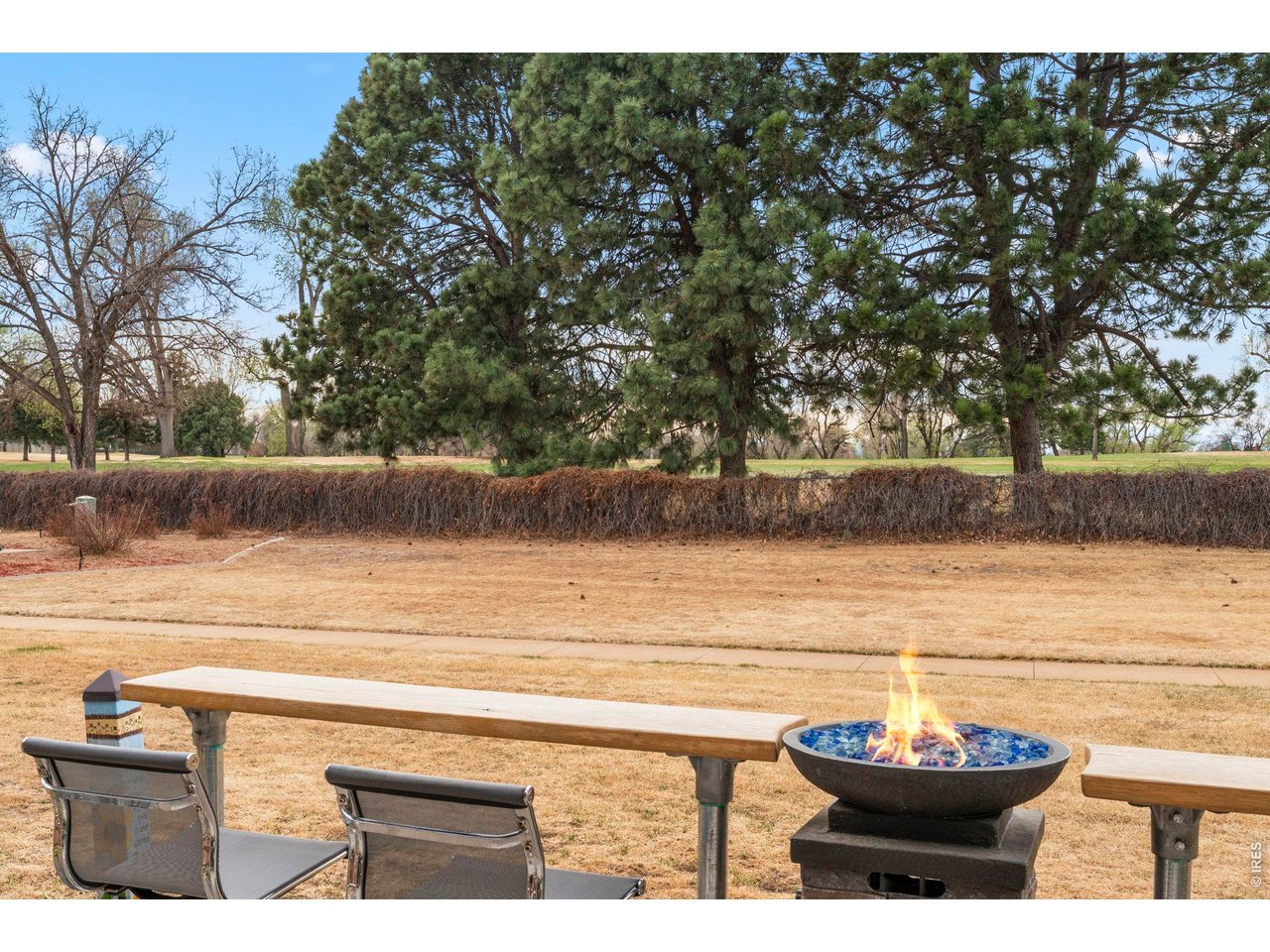 39 Ward Drive, Unit 104 Greeley, CO 80634 - Photo 28 of 31 a view of a lake from a outdoor space