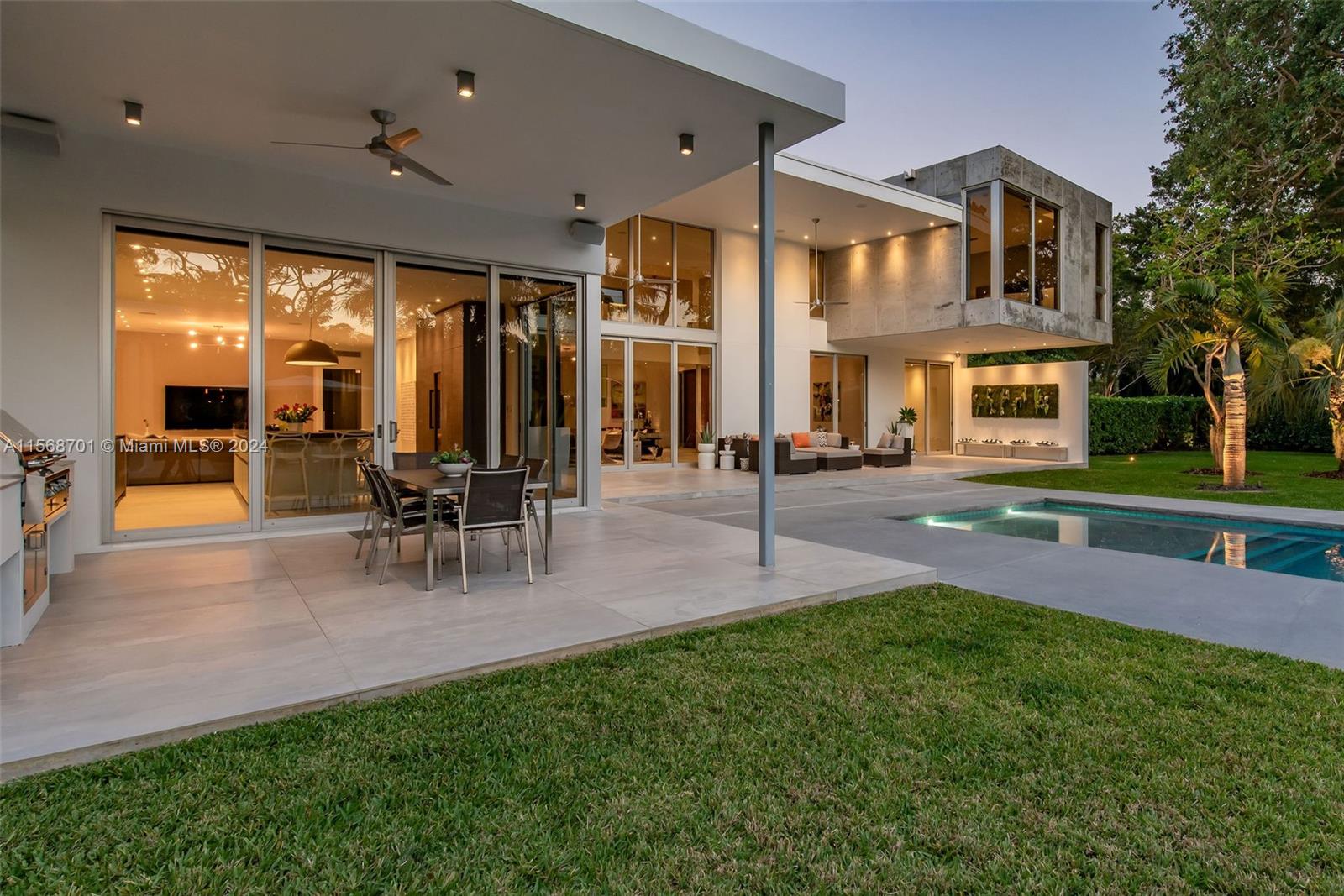 6795 Southwest 113th Street Pinecrest, FL 33156 - Photo 27 of 30 a view of a house with a swimming pool