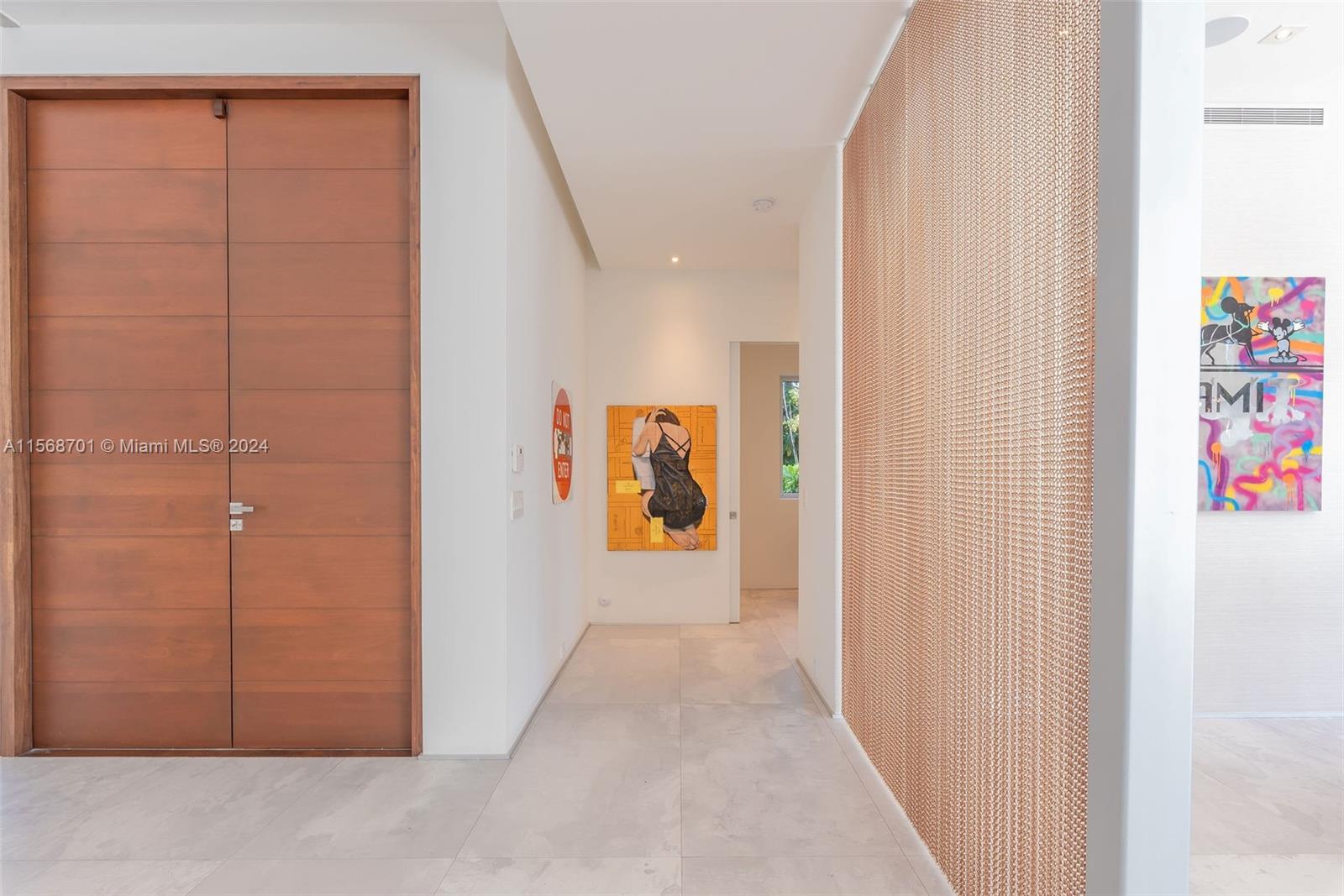 6795 Southwest 113th Street Pinecrest, FL 33156 - Photo 4 of 30 a view of a hallway with hallway to closet area
