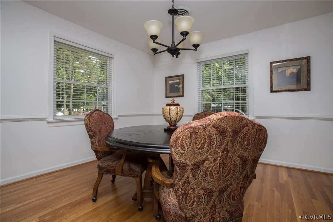 1620 Featherstone Drive Midlothian, VA 23113 - Photo 11 of 29 a view of a dining room with furniture window and wooden floor
