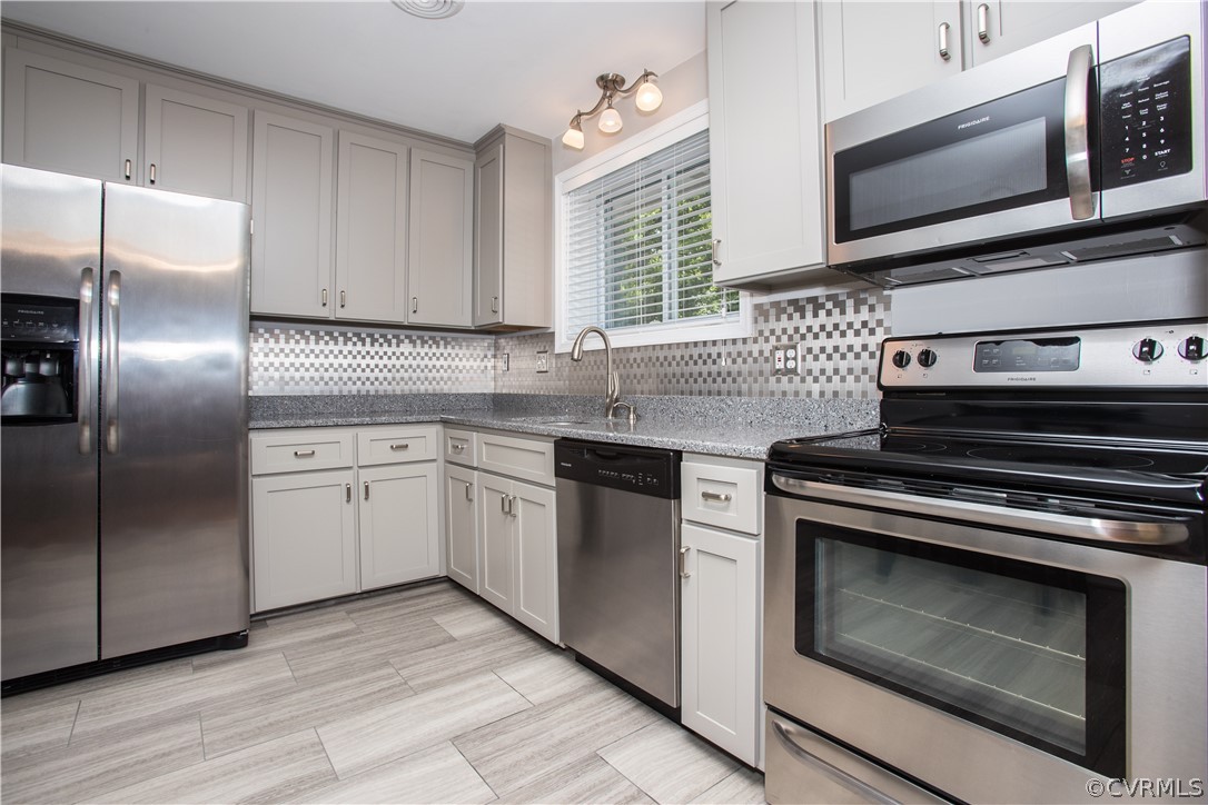 1620 Featherstone Drive Midlothian, VA 23113 - Photo 13 of 29 a kitchen with cabinets stainless steel appliances and a sink