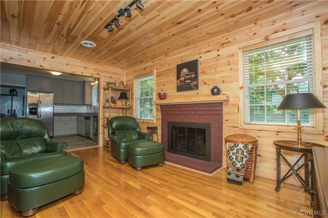 1620 Featherstone Drive Midlothian, VA 23113 - Photo 17 of 29 a living room with furniture and a fireplace