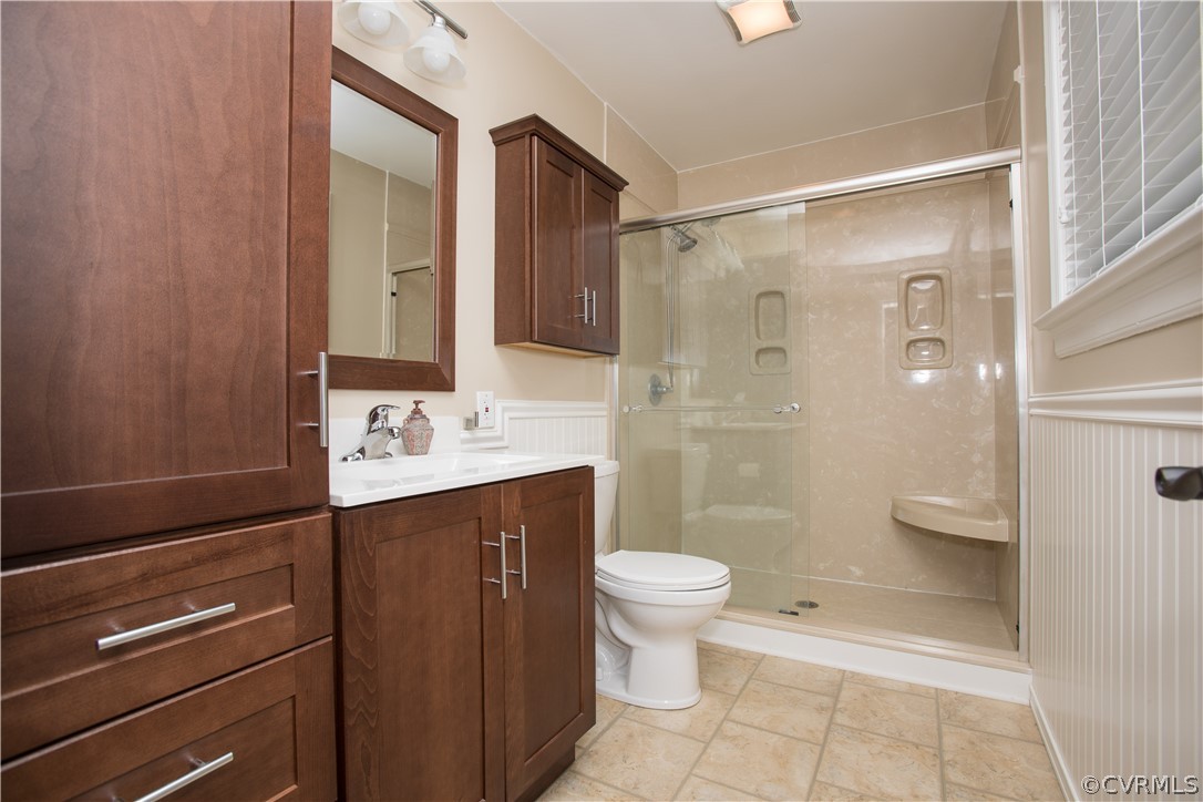 1620 Featherstone Drive Midlothian, VA 23113 - Photo 21 of 29 a bathroom with a shower sink vanity and toilet