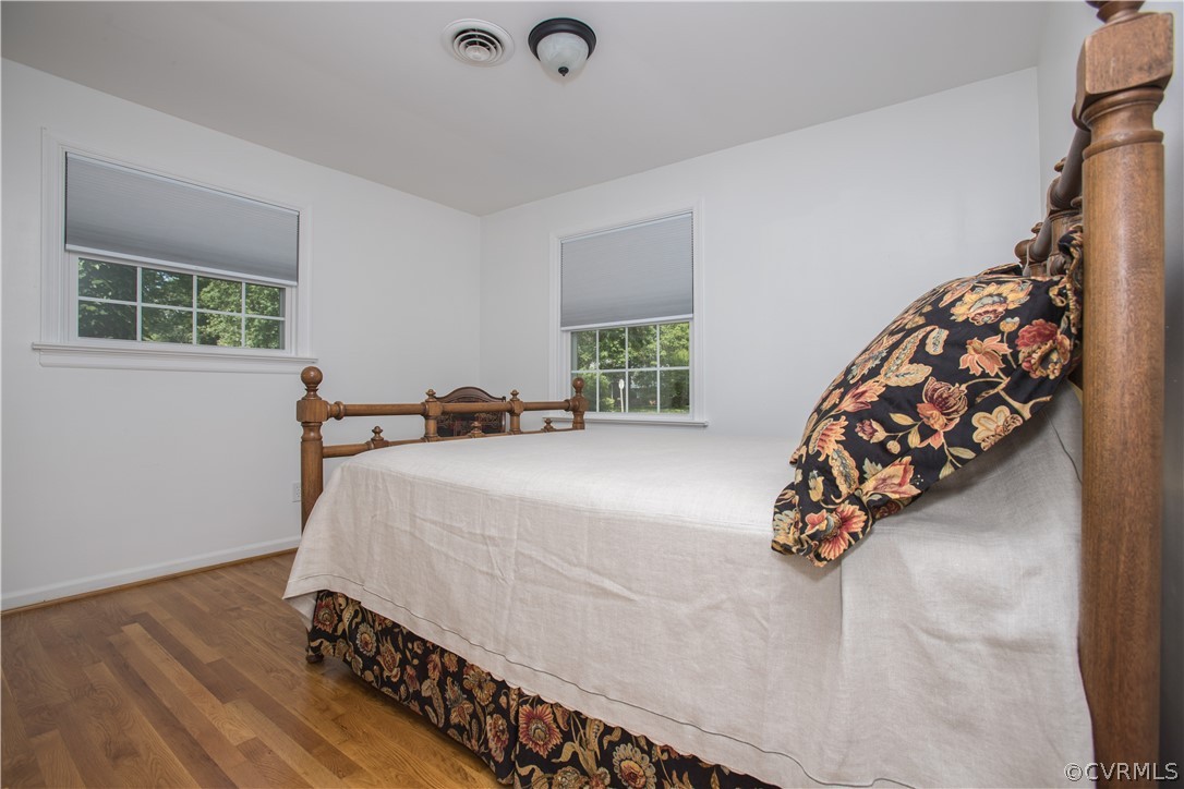 1620 Featherstone Drive Midlothian, VA 23113 - Photo 23 of 29 a bed sitting in a bedroom next to a window