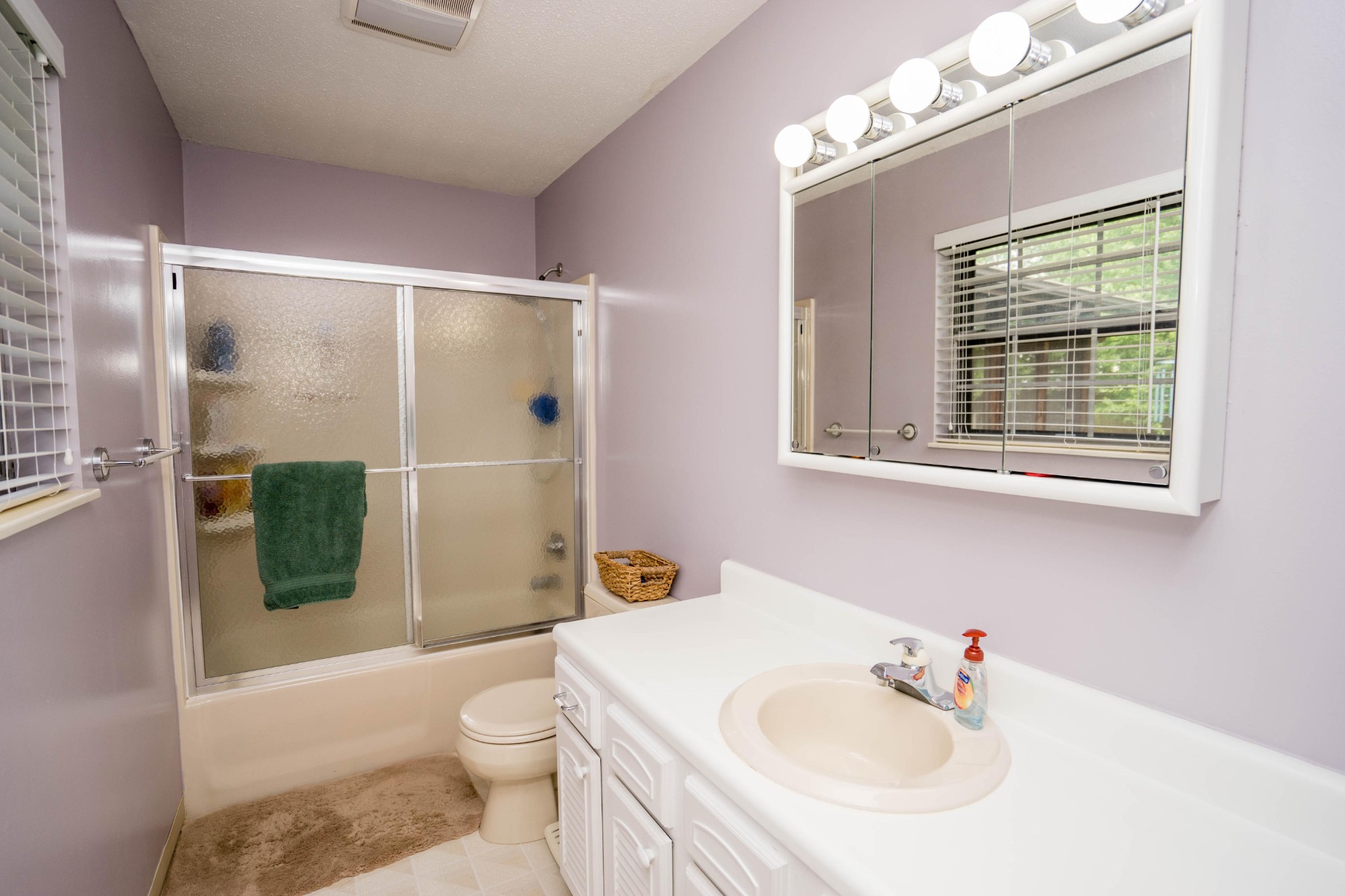 441 Orchard Knob Road Clinton, TN 37716 - Photo 14 of 33 a bathroom with a sink toilet and shower