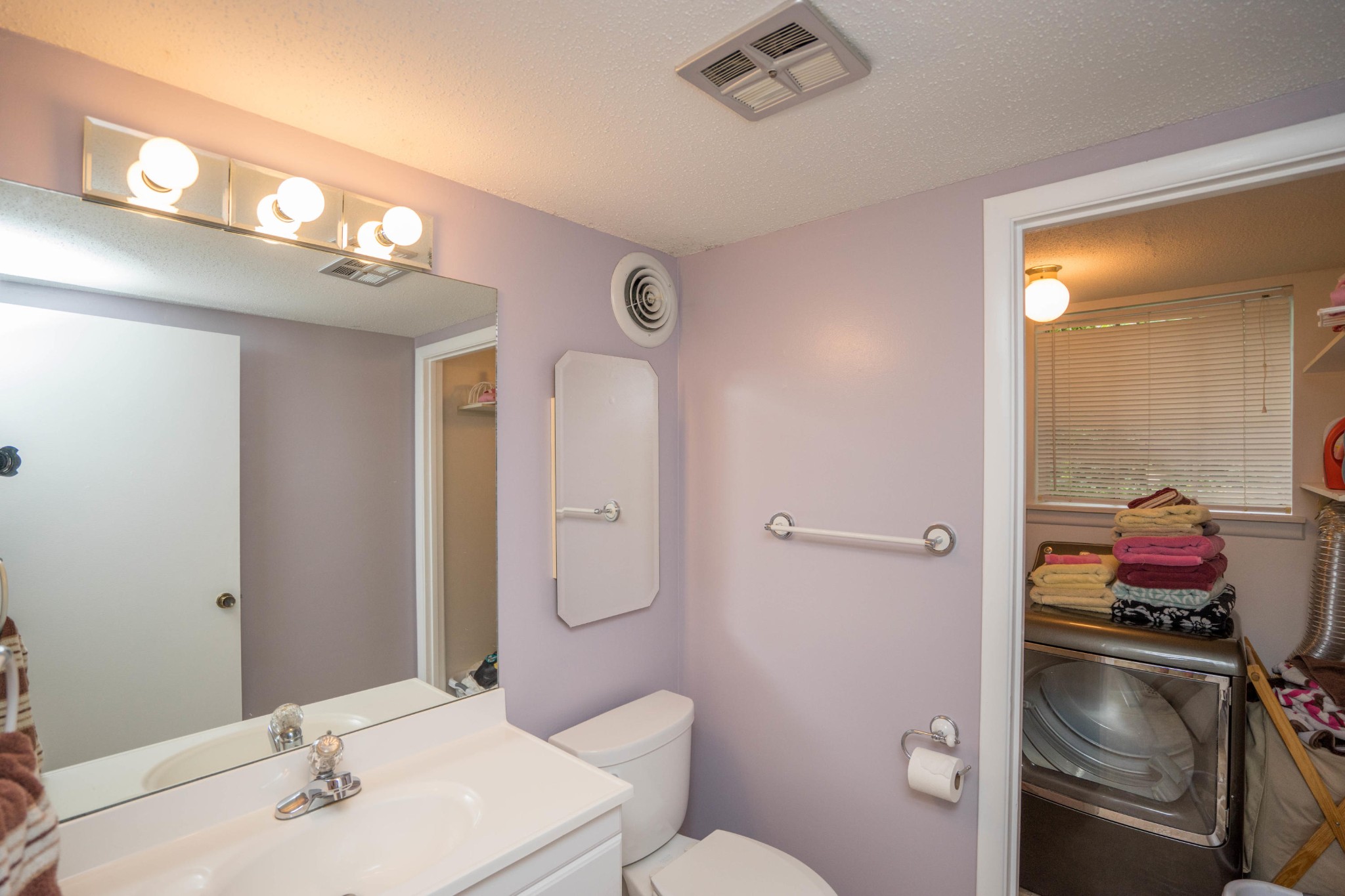 441 Orchard Knob Road Clinton, TN 37716 - Photo 18 of 33 a bathroom with a sink and a mirror