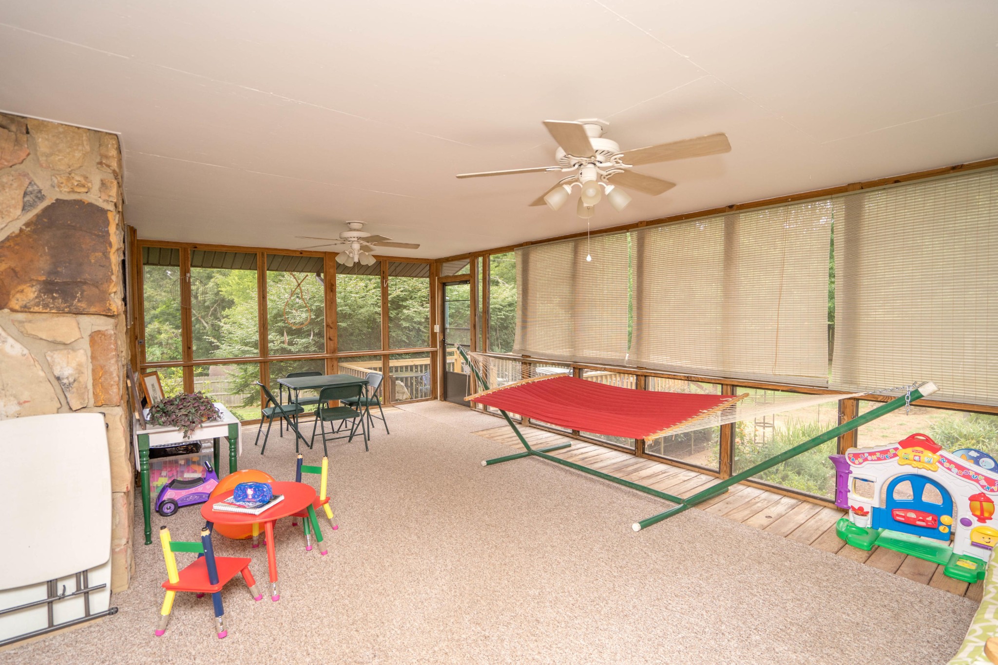 441 Orchard Knob Road Clinton, TN 37716 - Photo 22 of 33 wooden floor with a table tennis chairs and chandelier in it