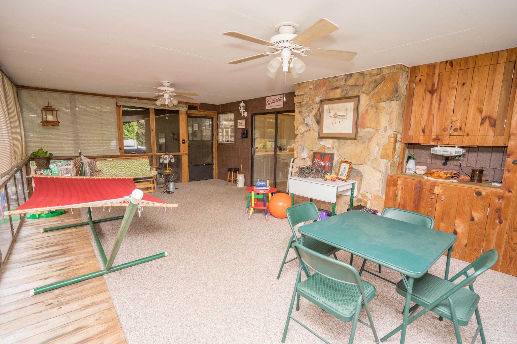 441 Orchard Knob Road Clinton, TN 37716 - Photo 23 of 33 a living room with dining room and wooden floor