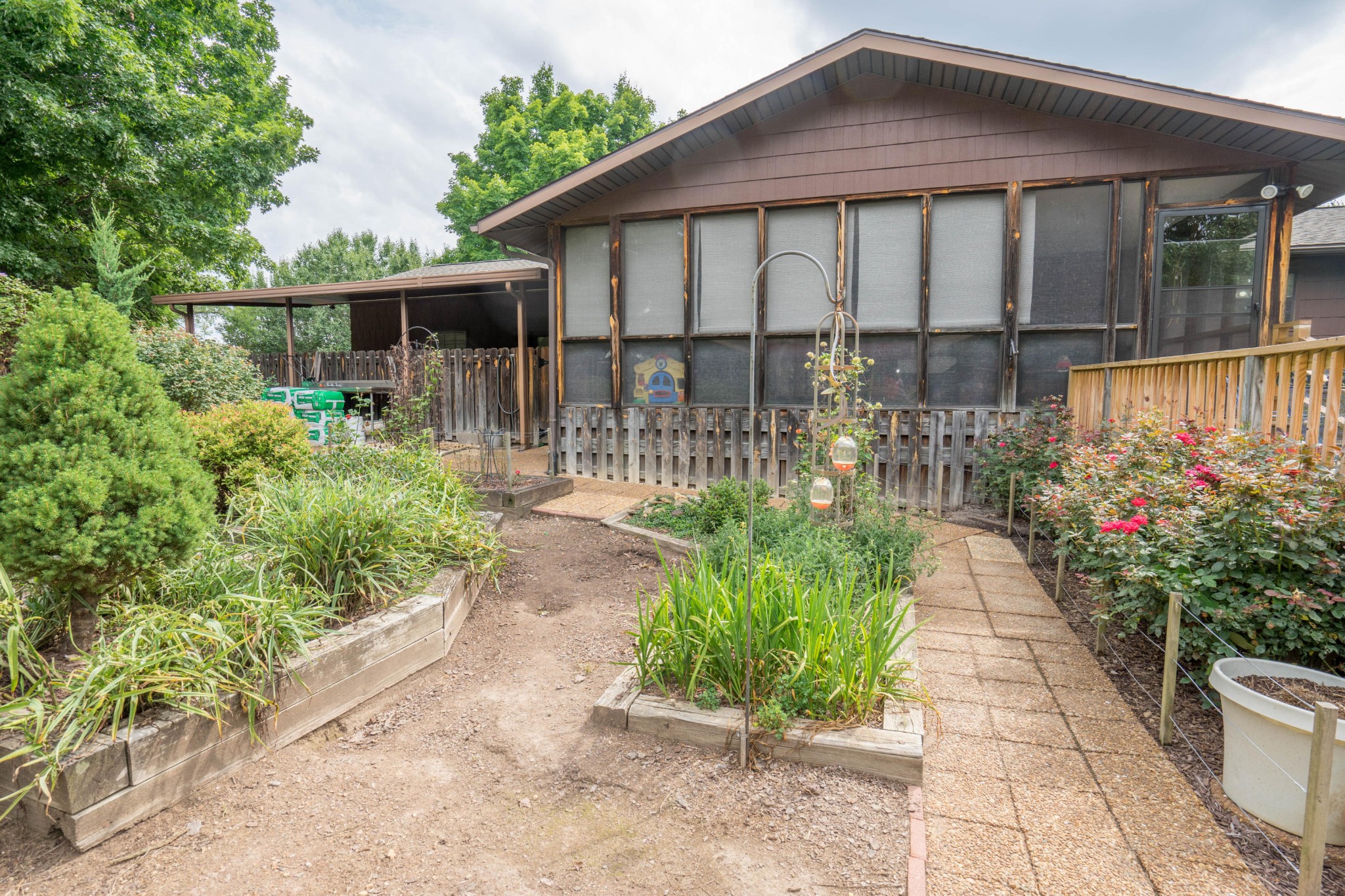 441 Orchard Knob Road Clinton, TN 37716 - Photo 27 of 33 a front view of a house with a garden