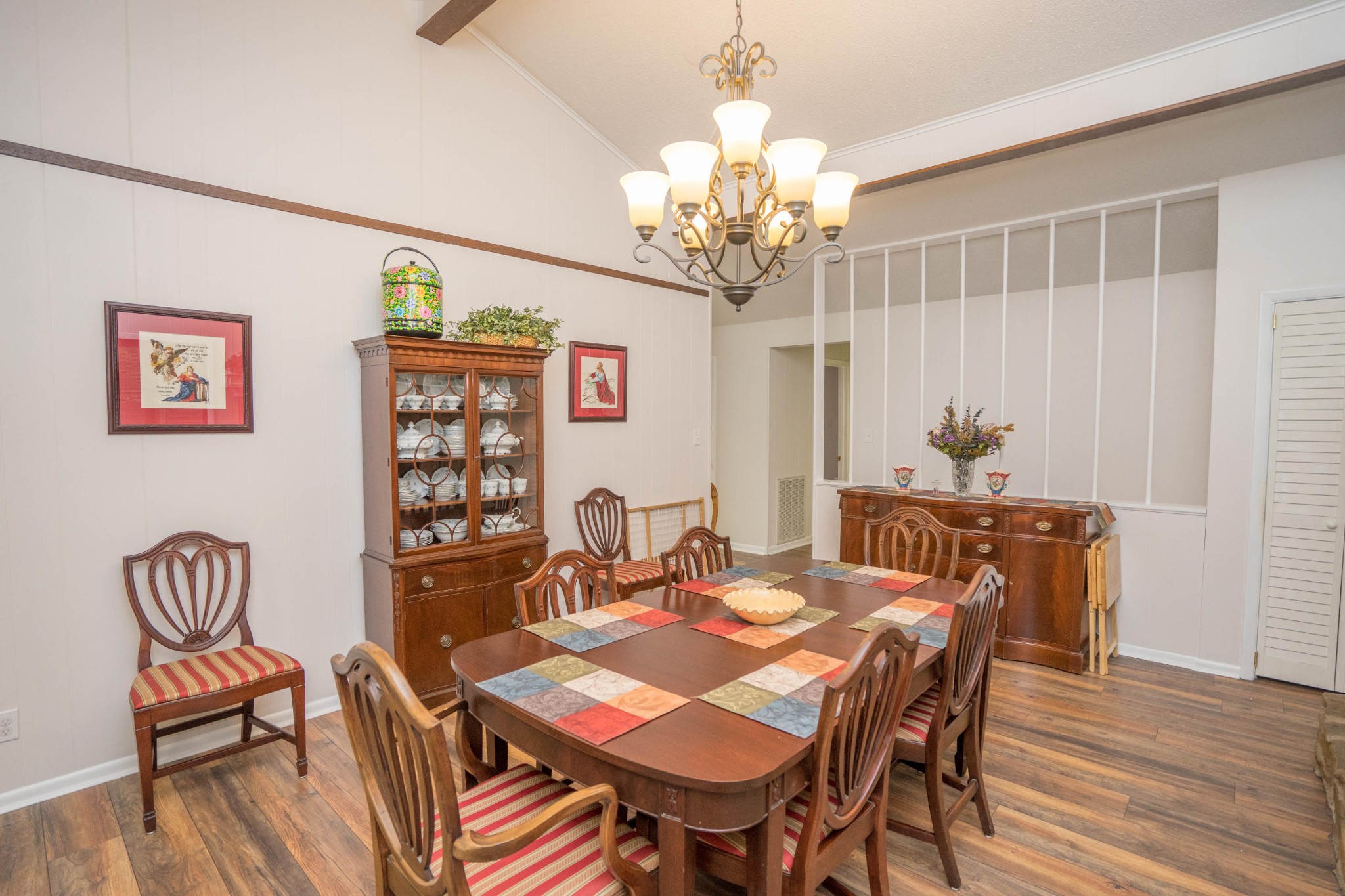 441 Orchard Knob Road Clinton, TN 37716 - Photo 8 of 33 a view of a dining room with furniture wooden floor and a chandelier