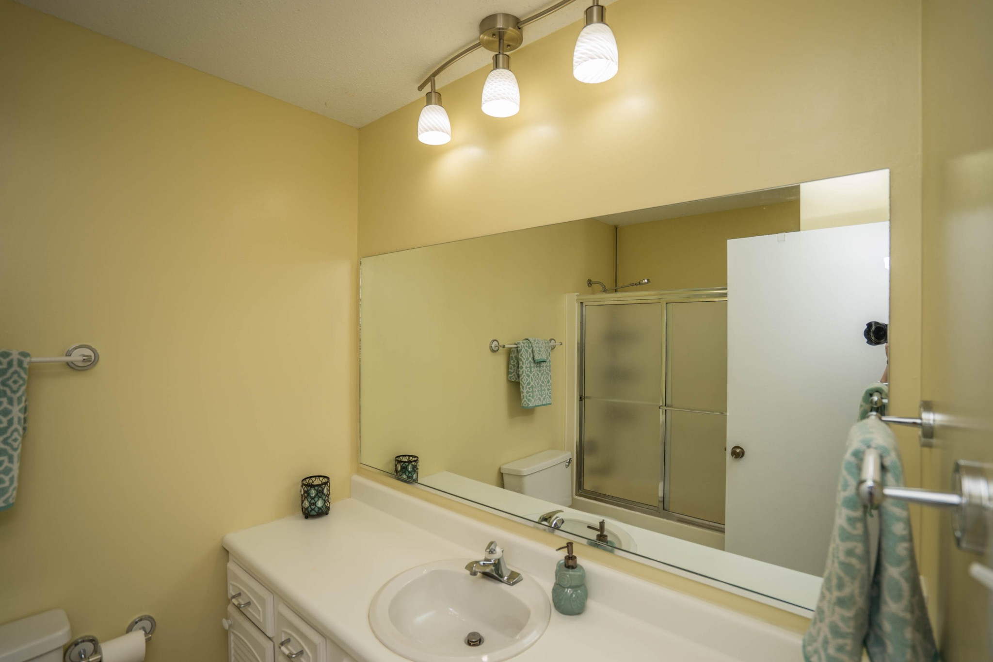 441 Orchard Knob Road Clinton, TN 37716 - Photo 10 of 33 a bathroom with a sink and a mirror