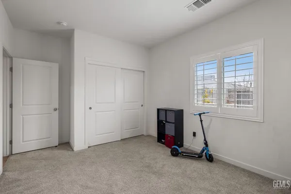 a living room with furniture a window and a couch