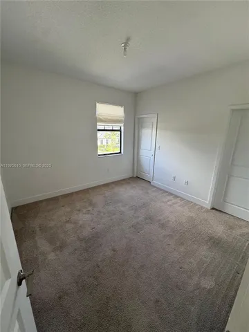 a view of a room with an empty space