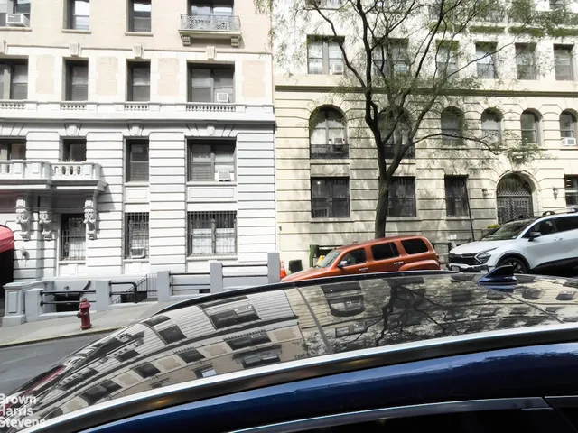 a car parked in front of a building