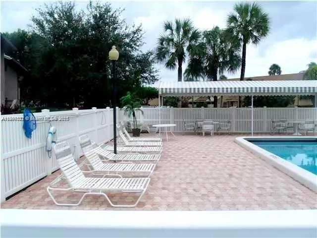 a view of outdoor space patio and swimming pool