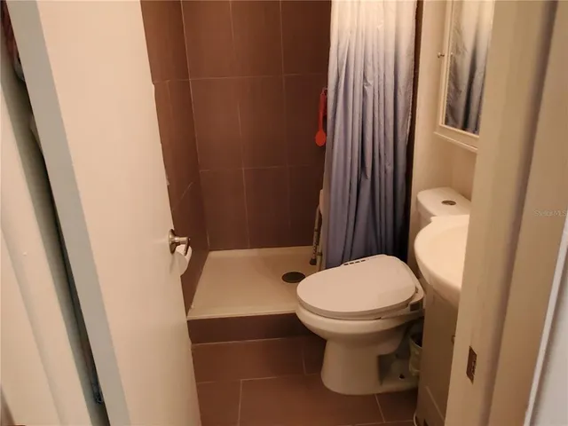 a bathroom with a sink and a toilet